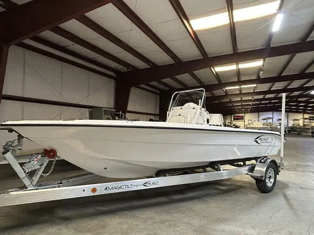 Slide: The Image of 2025 ALK2 Boats 22 CRS on trailer in warehouse setting. - 1