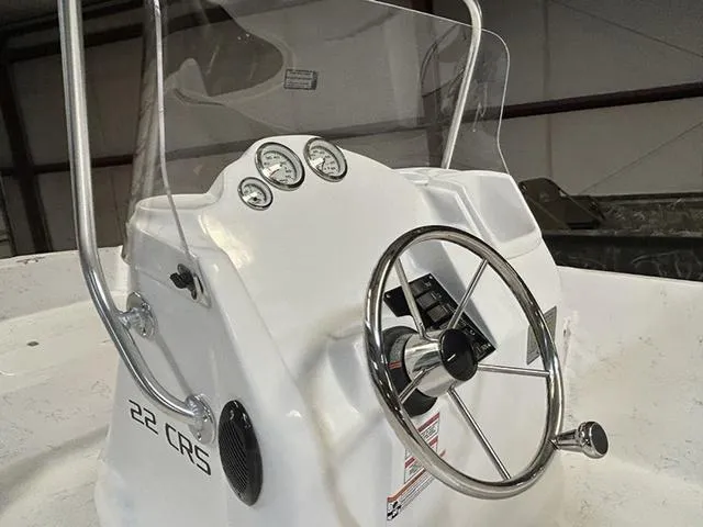 Slide: The Image of 2025 ALK2 Boats 22 CRS console with steering wheel and gauges. - 5