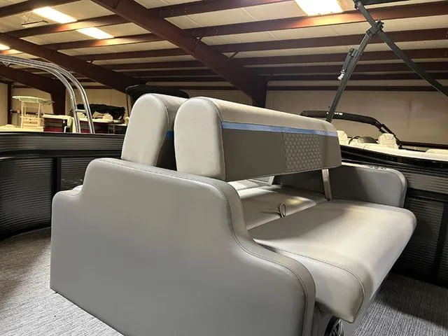 Slide: The Image of 2023 Qwest Pontoons 822 E-Class interior with gray seating and modern design. - 15