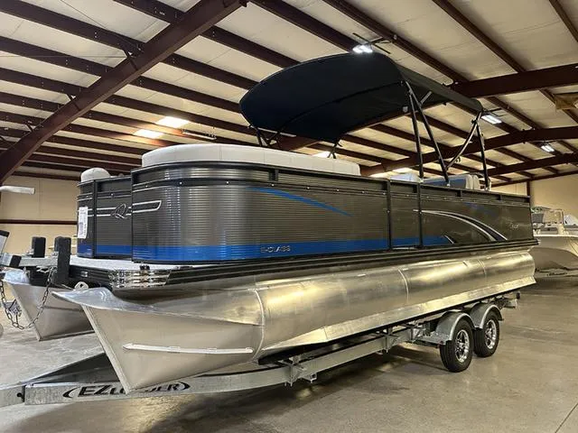 Slide: The Image of 2023 Qwest Pontoons 822 E-Class Splash Pad Triple Tube LT in showroom, side view. - 3