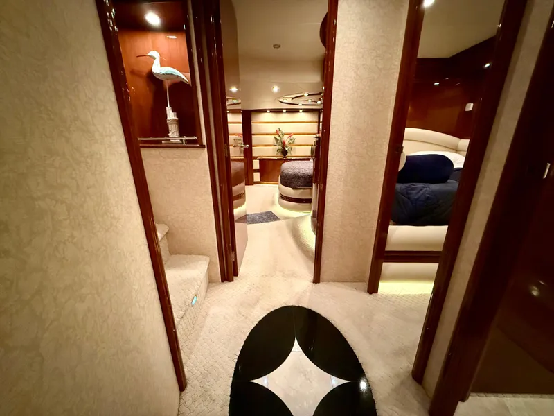 Slide: The Image of Luxurious interior of a 2005 Marquis 65 yacht with elegant decor and plush furnishings. - 38