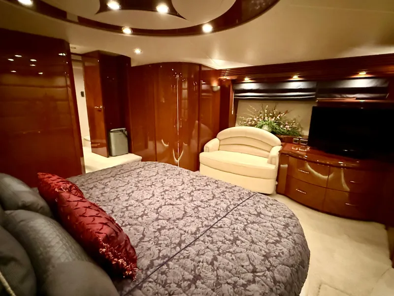 Slide: The Image of Luxurious 2005 Marquis 65 yacht bedroom with elegant decor and modern amenities. - 47