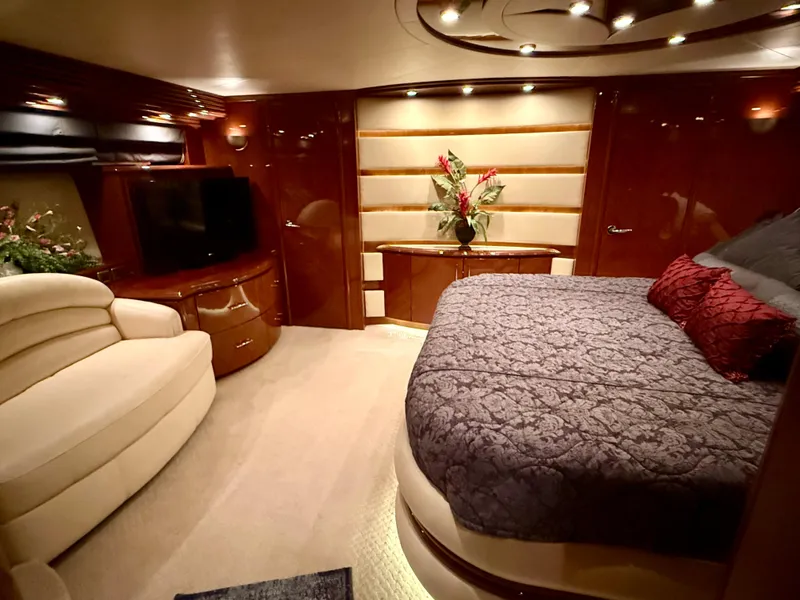 Slide: The Image of Luxurious interior of a 2005 Marquis 65 yacht with elegant bedroom decor. - 48