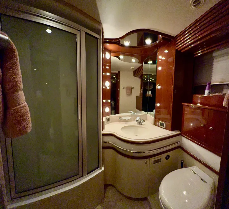 Slide: The Image of Luxurious bathroom interior of a 2005 Marquis 65 yacht with elegant fixtures and lighting. - 51
