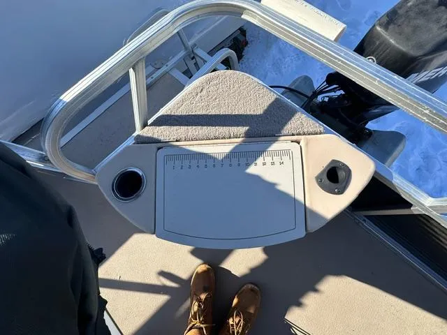 Slide: The Image of 2012 Sun Tracker Bass Buggy 18 DLX deck with fishing station and motor. - 7