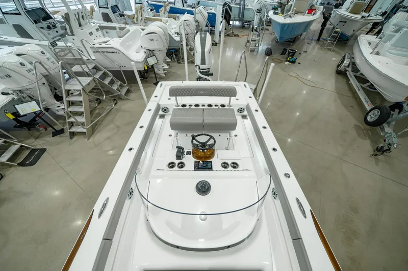 Slide: The Image of 2024 Valhalla Boatworks V-28 in showroom, showcasing sleek design and modern features. - 18