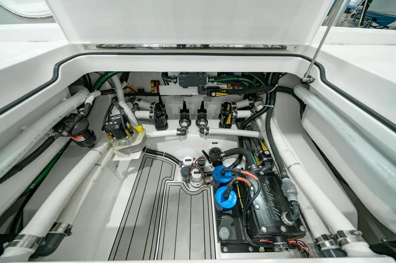 Slide: The Image of 2024 Valhalla Boatworks V-28 engine compartment with advanced mechanical systems and wiring. - 35