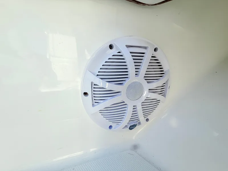 Slide: The Image of White speaker on 2024 SeaHunter 28 Floridian boat interior. - 24