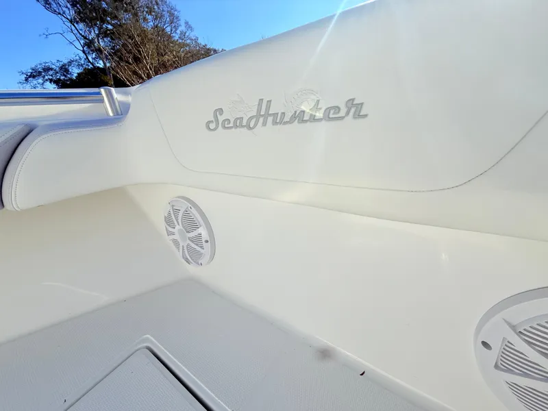 Slide: The Image of 2024 SeaHunter 28 Floridian boat interior with logo and speaker detail. - 29