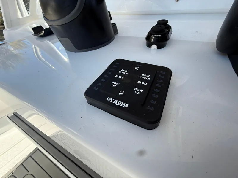 Slide: The Image of Control panel on 2024 SeaHunter 28 Floridian boat dashboard. - 7