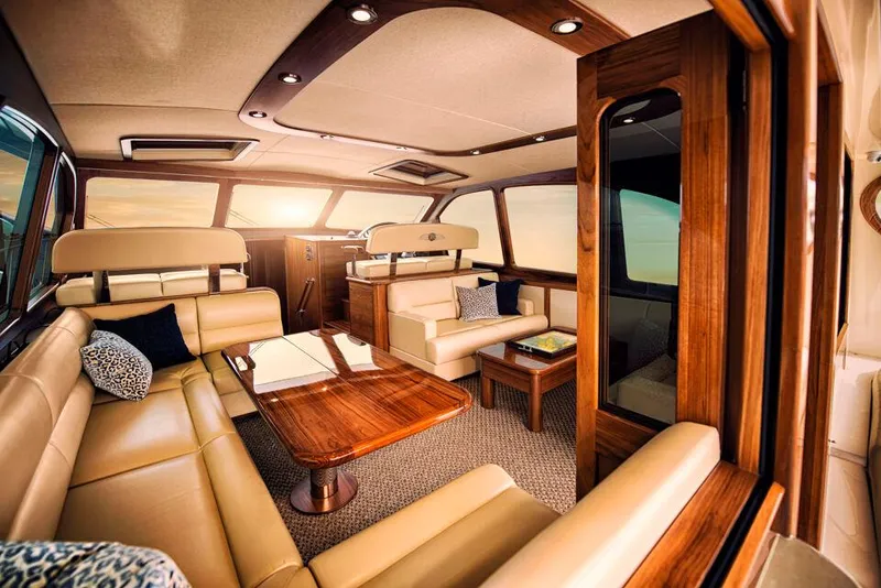 Slide: The Image of Luxurious interior of 2026 Palm Beach Motor Yachts PB55, featuring elegant wood and leather design. - 12