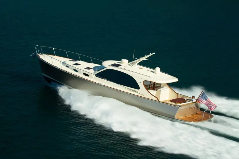 Slide: The Image of 2026 Palm Beach Motor Yachts PB55 cruising on open water, showcasing sleek design and performance. - 22