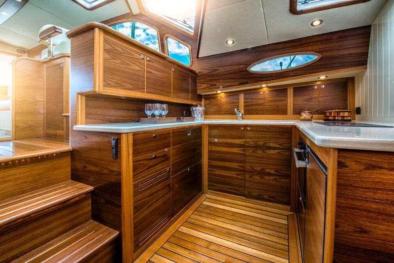 Slide: The Image of Luxurious 2026 Palm Beach Motor Yachts PB55 interior with elegant wood finish and modern amenities. - 3