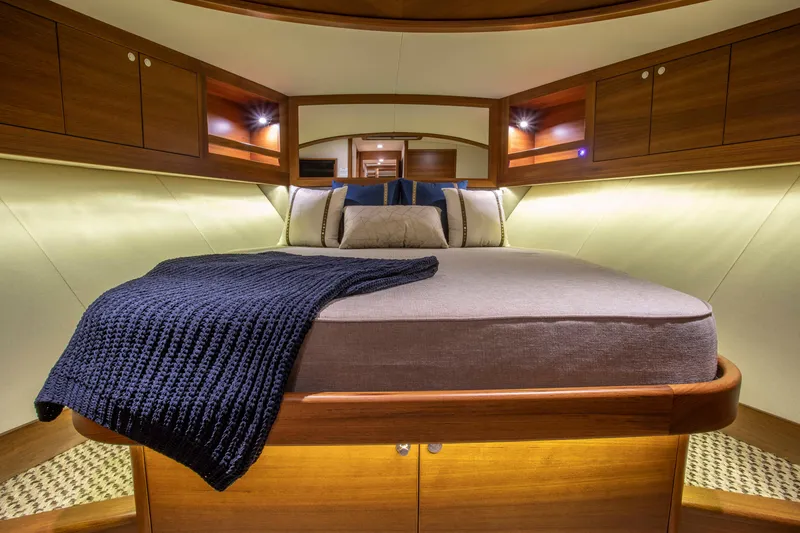 Slide: The Image of Luxurious cabin interior of 2026 Palm Beach Motor Yachts PB55 with elegant wood finishes. - 4