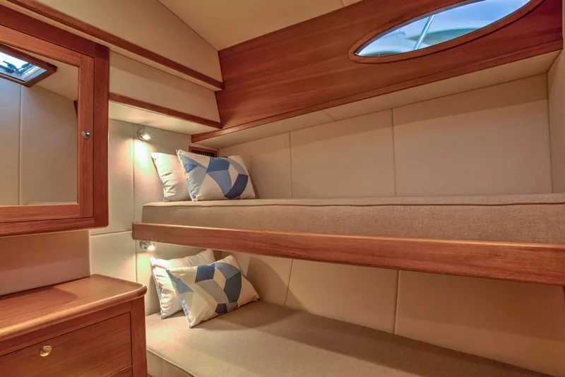 Slide: The Image of Luxurious cabin interior of 2026 Palm Beach Motor Yachts PB55 with cozy bunk beds. - 9