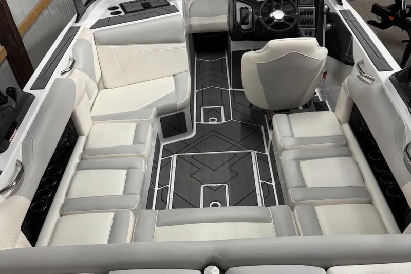 Slide: The Image of Luxurious interior of 2025 Supreme S220 boat with white seating and modern design. - 14