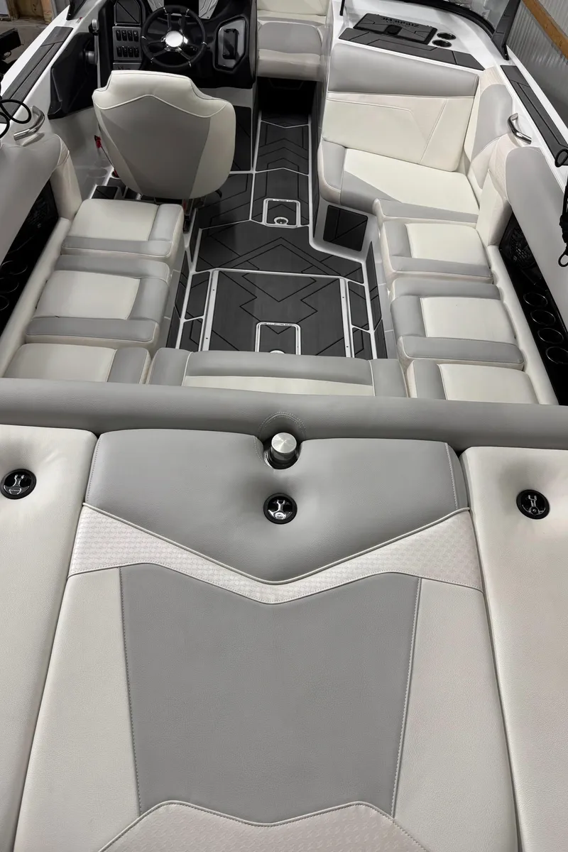 Slide: The Image of 2025 Supreme S220 boat interior with modern seating and sleek design. - 15