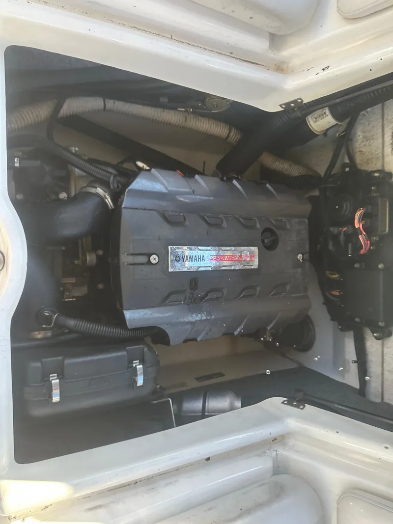 Slide: The Image of 2013 Yamaha Boats SX192 engine compartment, showcasing internal components and layout. - 18