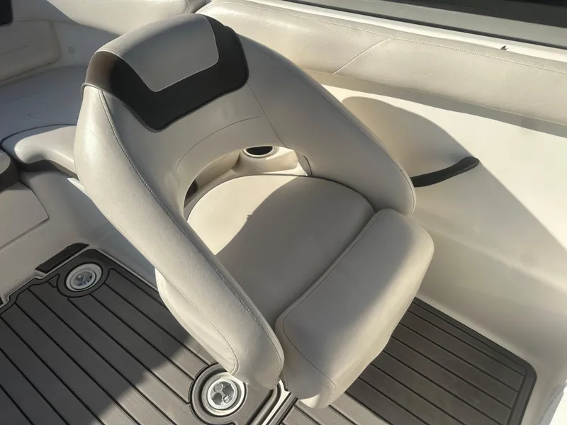 Slide: The Image of 2013 Yamaha Boats SX192 interior seat with gray upholstery and black accents. - 29