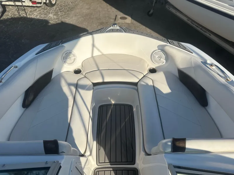 Slide: The Image of 2013 Yamaha SX192 boat interior with white seating and black accents. - 37