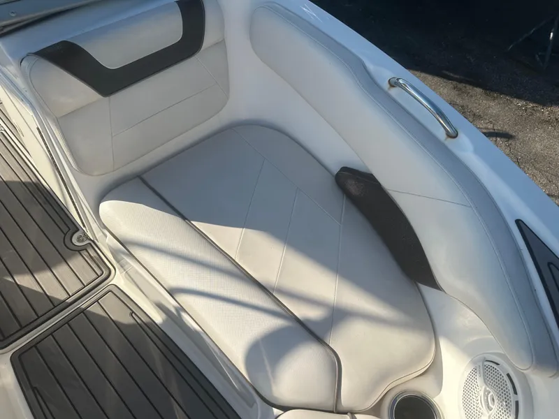 Slide: The Image of 2013 Yamaha Boats SX192 interior seating with white and black upholstery. - 40