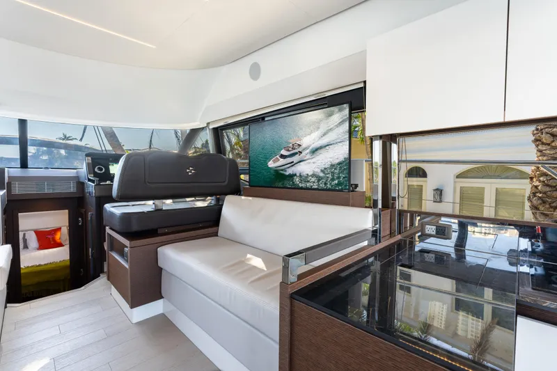 Slide: The Image of Luxurious interior of 2023 Prestige 460 Fly yacht with modern seating and sleek design. - 19
