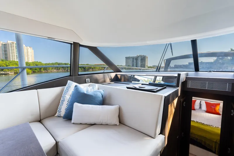 Slide: The Image of Luxurious interior of 2023 Prestige 460 Fly yacht with scenic waterfront view. - 20