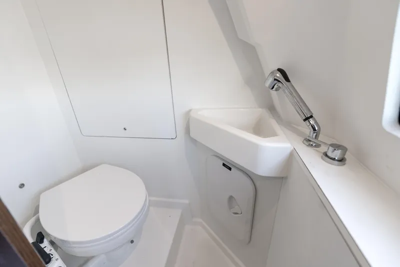 Slide: The Image of Modern bathroom in 2023 Prestige 460 Fly yacht with compact sink and toilet. - 35