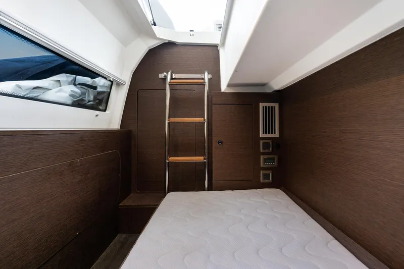 Slide: The Image of Interior cabin of 2023 Prestige 460 Fly yacht with modern wood finish. - 36