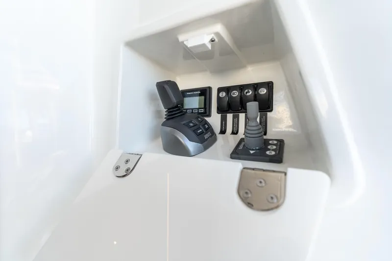 Slide: The Image of Control panel of 2023 Prestige 460 Fly yacht, featuring modern navigation equipment. - 9