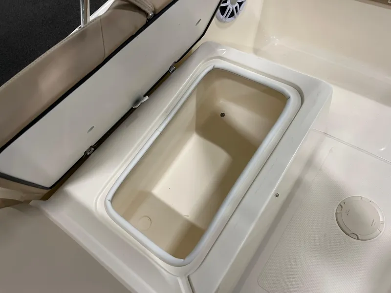 Slide: The Image of 2025 Scout 175 Sport Dorado boat storage compartment, open and empty. - 7