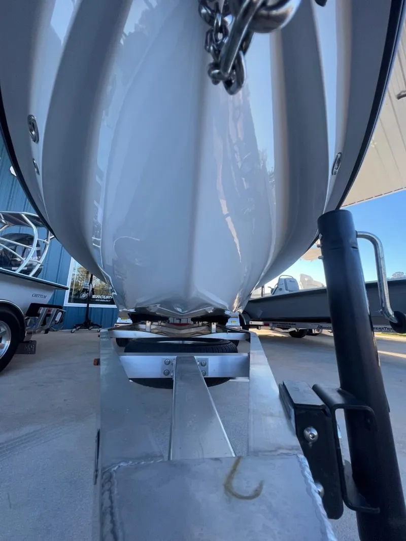 Slide: The Image of 2024 Chittum Skiffs Challenger 18 boat on trailer, viewed from below. - 10