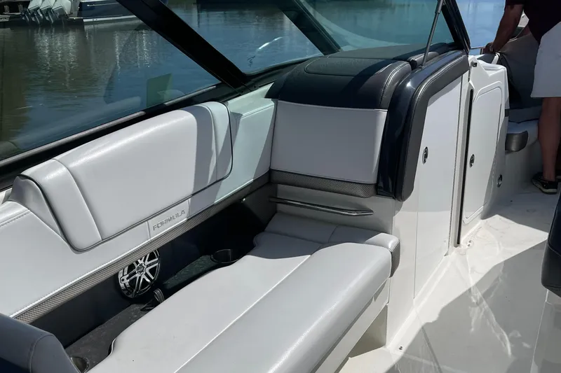 Slide: The Image of 2020 Formula 330 Crossover Bowrider interior with sleek seating and modern design. - 4