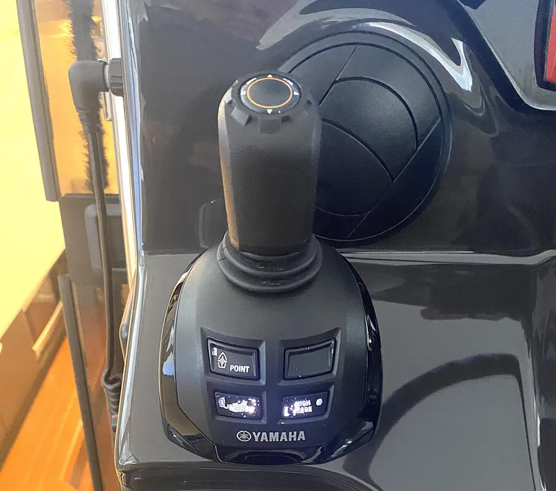 Slide: The Image of Yamaha joystick control on 2019 Pursuit S 408 Sport boat dashboard. - 22