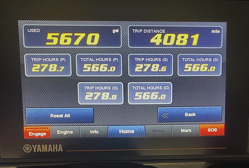 Slide: The Image of Display screen showing fuel usage and trip data for a 2019 Pursuit S 408 Sport. - 23