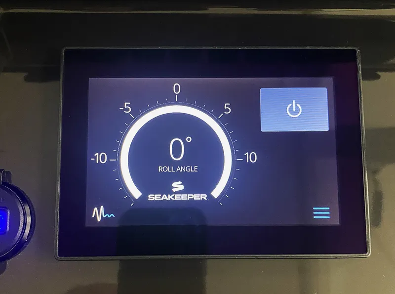 Slide: The Image of Seakeeper control display showing roll angle on 2019 Pursuit S 408 Sport boat. - 25