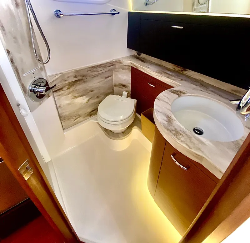 Slide: The Image of Luxurious bathroom in 2019 Pursuit S 408 Sport boat with modern fixtures and elegant design. - 41