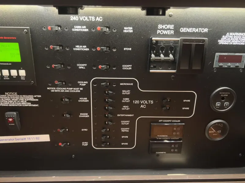 Slide: The Image of Electrical control panel of a 2019 Pursuit S 408 Sport boat. - 42
