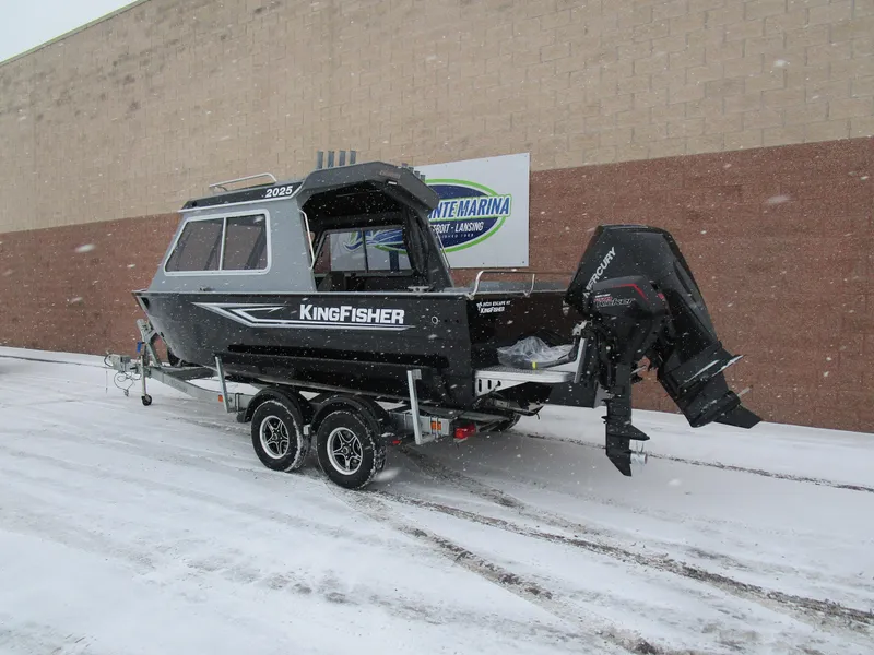 Slide: The Image of 2025 KingFisher Escape HT boat on trailer in snowy setting. - 29