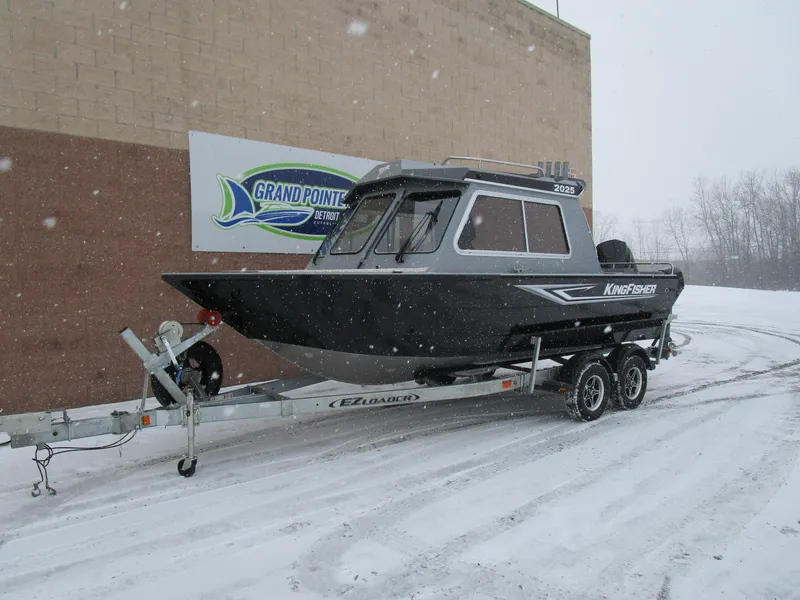 Slide: The Image of 2025 KingFisher Escape HT boat on trailer in snowy setting. - 30