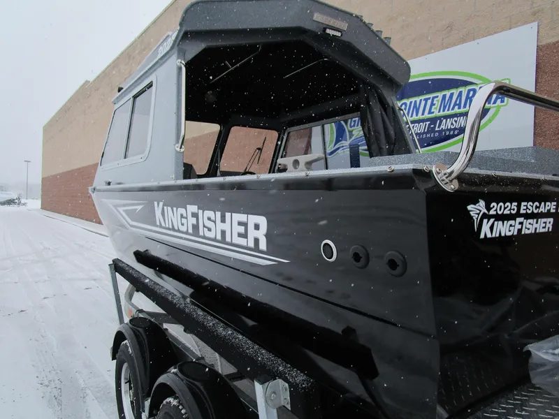 Slide: The Image of KingFisher 2025 Escape HT boat on trailer in snowy outdoor setting. - 33