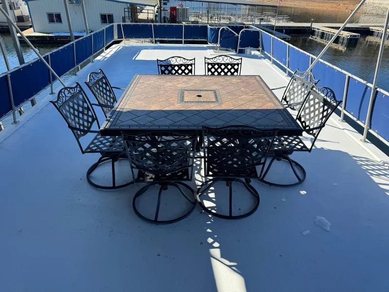 Slide: The Image of Outdoor dining set on 1996 Stardust Cruisers 72x16 houseboat deck. - 10
