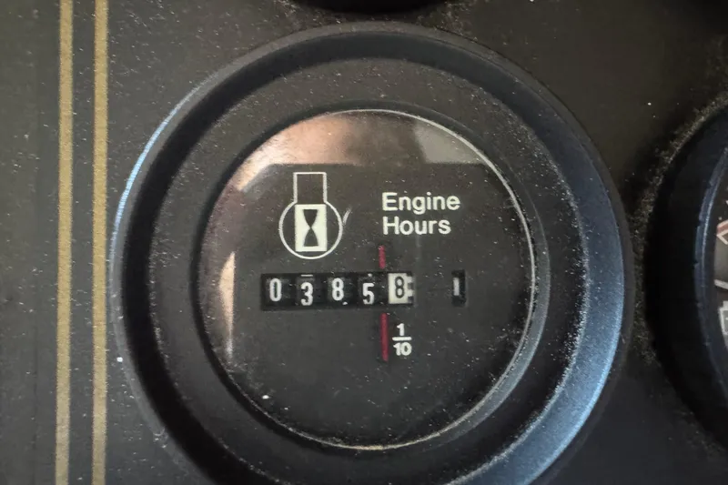 Slide: The Image of Close-up of engine hour meter reading 3858 on 1996 Stardust Cruisers 72x16 Houseboat. - 14