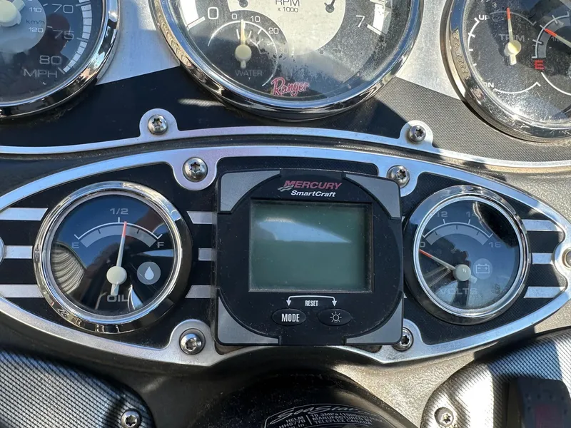 Slide: The Image of Dashboard of a 2012 Ranger 619VS boat with Mercury SmartCraft display and gauges. - 6