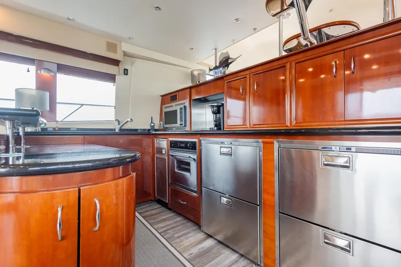 Slide: The Image of Luxurious kitchen interior of 2005 Carver 560 Voyager yacht with modern appliances. - 32