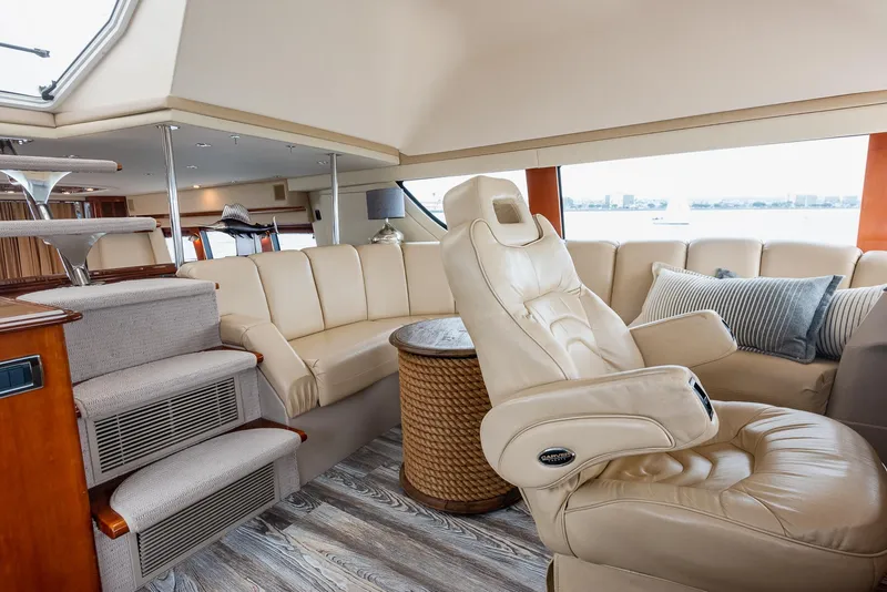 Slide: The Image of Luxurious interior of 2005 Carver 560 Voyager yacht with plush seating and elegant decor. - 39