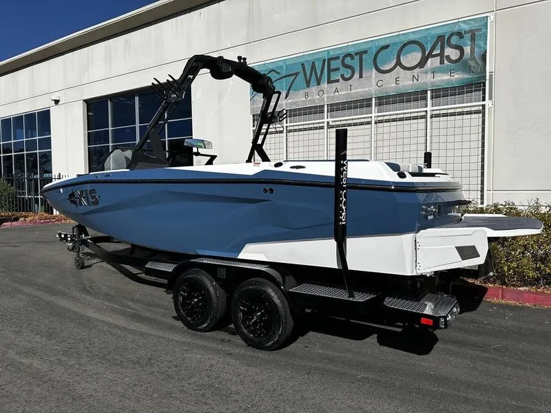 Slide: The Image of 2025 Axis A225 boat on trailer at West Coast Boat Center. - 1