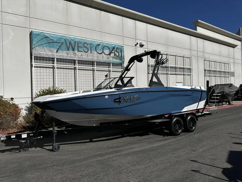 Slide: The Image of 2025 Axis A225 boat on trailer at West Coast Boat Center. - 2