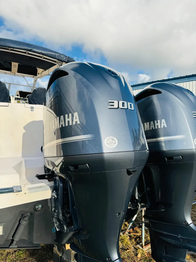 Slide: The Image of 2005 Grady-White Marlin 300 with twin Yamaha 300 outboard engines. - 14