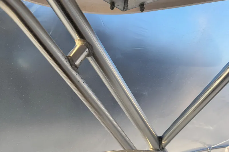 Slide: The Image of Close-up of metal framework on a 2005 Grady-White Marlin 300 boat. - 17